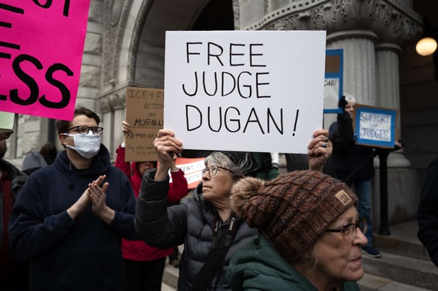 Demonstrators protest in front of the federal courthouse where Milwaukee County Circuit Judge Hannah Dugan appeared in front of a judge after being arrested by the FBI as she arrived for work at the Milwaukee County Courthouse on April 25, 2025, in Milwaukee, Wisconsin.