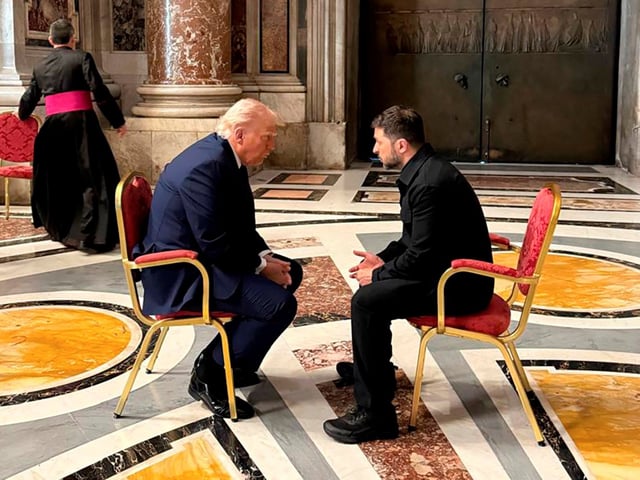 In this photo provided by the Ukrainian Presidential Press Office, Ukraine's President Volodymyr Zelenskyy, right, and President Donald Trump, talk as they attend the funeral of Pope Francis in Vatican, Saturday, April 26, 2025.(Ukrainian Presidential Press Office via AP)