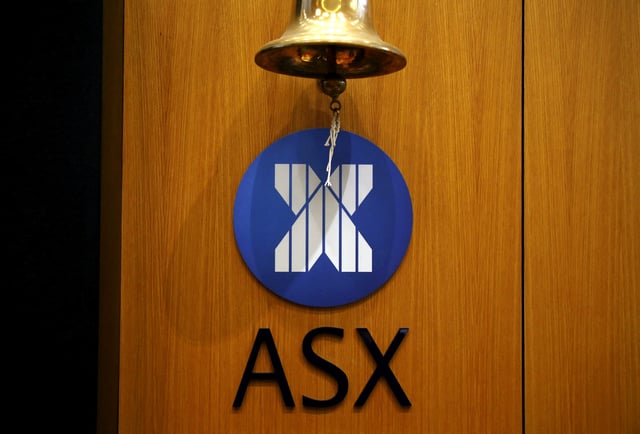 A bell used for official ceremonies hangs from a wall inside the Australian Securities Exchange (ASX) in Sydney, Australia, March 17, 2016. REUTERS/David Gray/File Photo