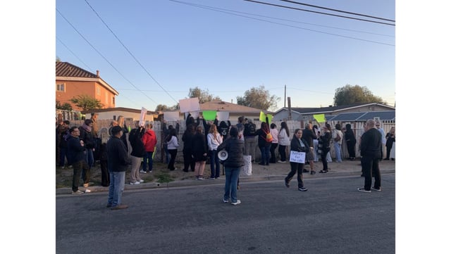Community members gathered outside the home of Alejandro Oliveras Acosta in Santa Ana Sunday, April 27 after he was released on bail. Acosta was arrested last week on suspicion of luring in neighborhood cats and harming or killing at least a dozen of them. (Photo courtesy OC Community Cats)