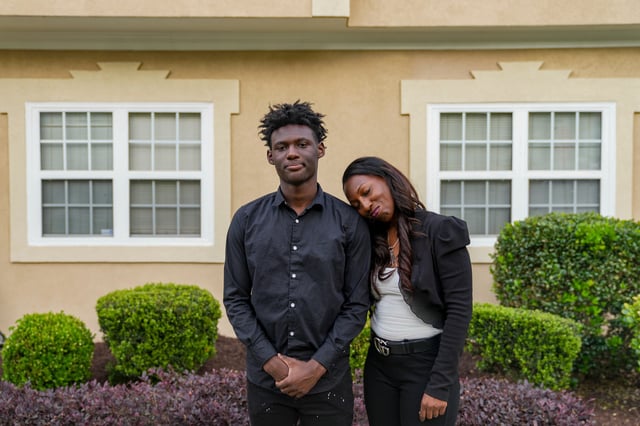 Trina Martin, cuddles her son Gabe Watson, 14, April 23, 2025 in Atlanta, Georgia, outside of Cliatt's home, the site of a mistaken FBI raid that took place while all three were inside the home in 2017. After multiple lower courts dismissed the victims' lawsuit, the Supreme Court will decide whether victims of wrong-house searches can sue the FBI.