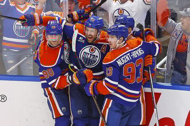 Apr 27, 2025; Edmonton, Alberta, CAN; The Edmonton Oilers celebrate a goal scored by forward Leon Draisaitl (29) during overtime against the Los Angeles Kings in game four of the first round of the 2025 Stanley Cup Playoffs at Rogers Place. Mandatory Credit: Perry Nelson-Imagn Images