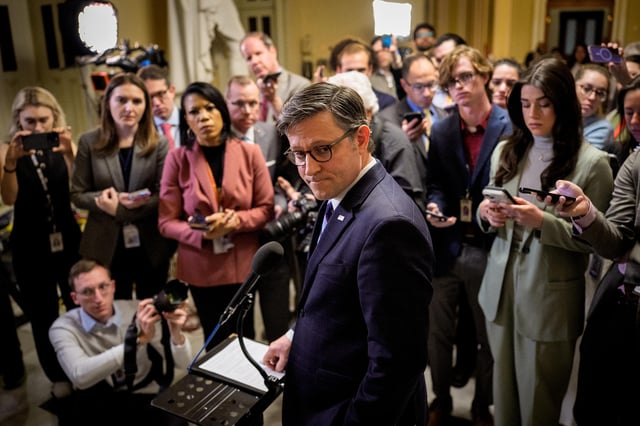 House Speaker Mike Johnson takes a question from a reporter after the House passes the Republican's budget plan at the US Capitol on April 10 in Washington, DC.
