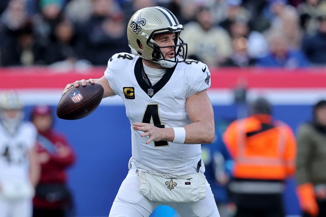 Dec 8, 2024; East Rutherford, New Jersey, USA; New Orleans Saints quarterback Derek Carr (4) drops back to pass against the New York Giants during the first quarter at MetLife Stadium. Brad Penner-Imagn Images/ File Photo