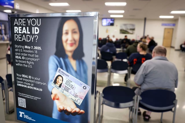 The South Salem DMV assists people on Friday, April 25, 2025 in Salem, Ore. Starting May 7, Oregon residents 18 years and older must have a REAL ID-compliant driver's license, permit or ID card or other form of TSA-approved identification to fly domestically.