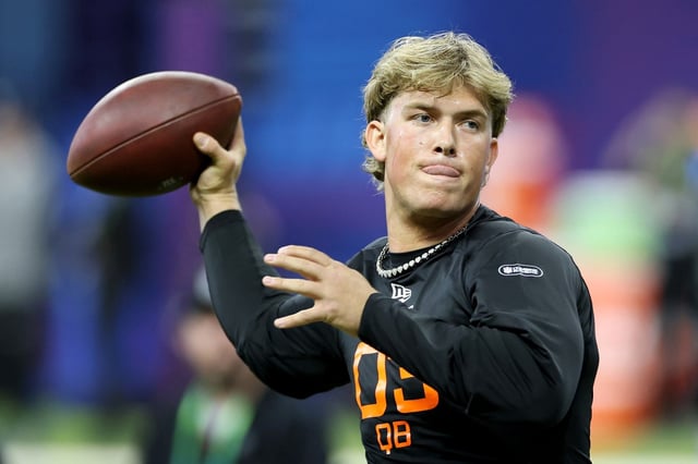 INDIANAPOLIS, INDIANA – MARCH 01: Jaxson Dart #QB03 of Mississippi participates in a drill during the NFL Scouting Combine at Lucas Oil Stadium on March 01, 2025 in Indianapolis, Indiana.  (Photo by Stacy Revere/Getty Images)