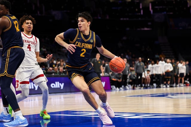 Cal’s Andrej Stojakovic drives toward the basket against Stanford in a second-round Atlantic Coast Conference Tournament game in Charlotte, N.C. on Wednesday night. (Allie Lawhon — ACC)