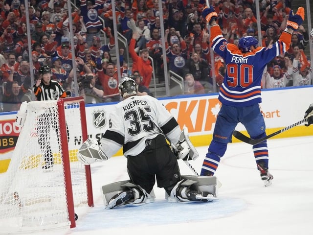 Edmonton Oilers Corey Perry (90) celebrates a goal scored on Los Angeles Kings goaltender Darcy Kuemper (35) during third-period NHL first-round playoff action on Sunday, April 27, 2025, in Edmonton.