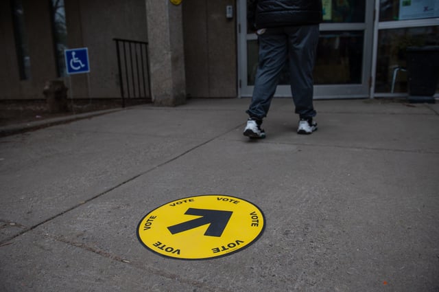 Elections Canada signage is seen at an advance polling location, in Toronto, Friday, April 18, 2025. THE CANADIAN PRESS/Laura Proctor