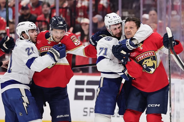 Anthony Cirelli #71 of the Tampa Bay Lightning fights against Sam Reinhart #13 of the Florida Panthers at the end of the second period in Game Three of the First Round of the 2025 Stanley Cup Playoffs at Amerant Bank Arena on April 26, 2025 in Sunrise, Florida.