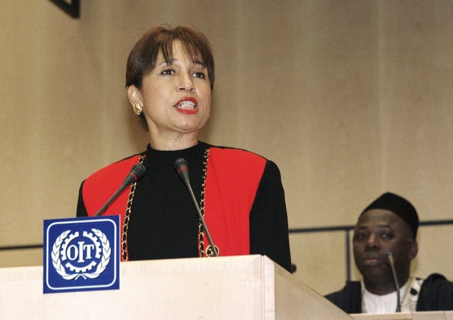 FILE - Alexis Herman, U.S. Secretary of Labor, addresses the 87th Annual International Labor Conference in Geneva, Switzerland, June 15, 1999. (AP Photo/Donald Stampfli, file)