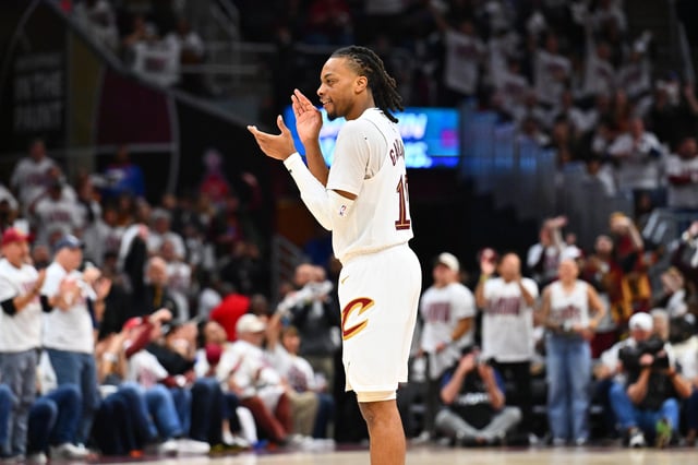 Darius Garland #10 of the Cleveland Cavaliers celebrates during the fourth quarter of game one of the first round of the Eastern Conference Playoffs against the Miami Heat at Rocket Arena on April 20, 2025 in Cleveland, Ohio. The Cavaliers defeated the Heat 121-100.