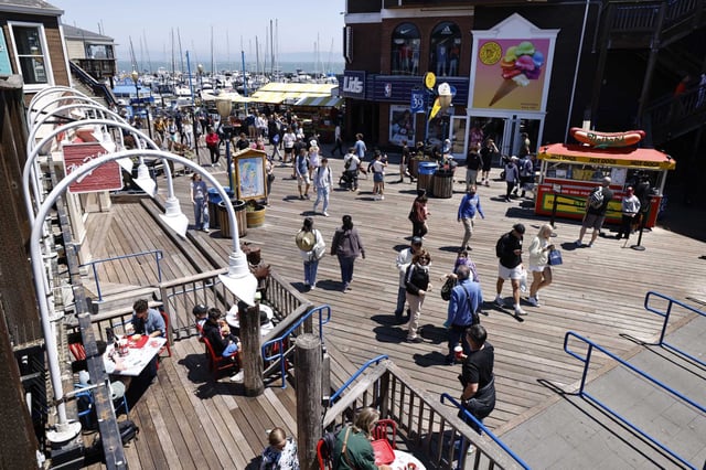 People mill about at Pier 39 in San Francisco in 2024. It remains one of the city’s premier tourist attractions.