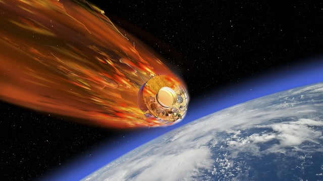 Satellite burning on its reentry into earth's atmosphere