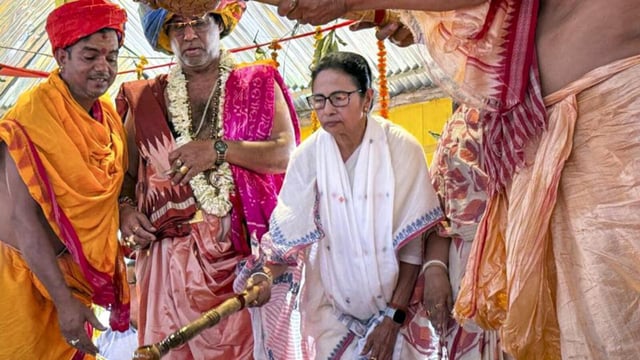 West Bengal chief minister Mamata Banerjee takes part in the sacred 'yajna' at the Jagannath temple at Digha in Purba Medinipur district (PTI/X@AITCofficial)