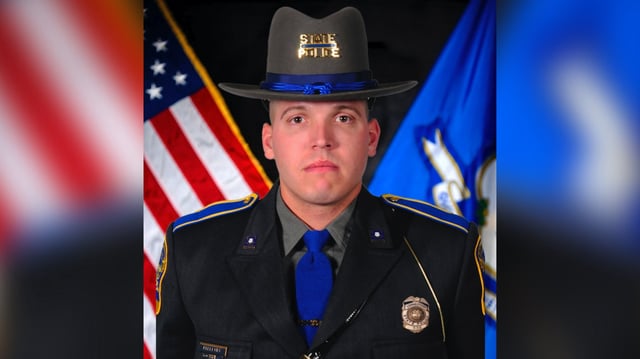 This undated photo provided by the Connecticut State Police, shows Trooper First Class Aaron Pelletier. Thousands of people including police officers from throughout the Northeast gathered for the funeral of Pelletier who was killed by a hit-and-run driver during a highway traffic stop last week. (Connecticut State Police via AP)