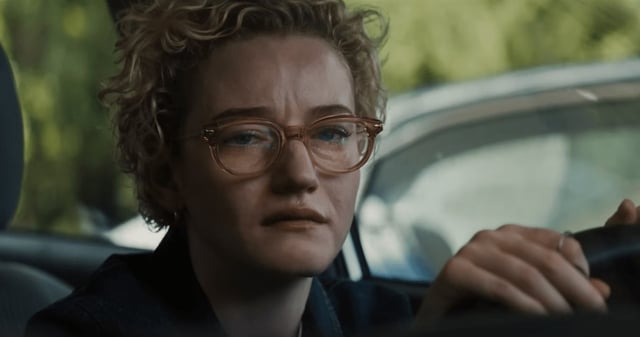 Julia Garner crying in her car as Justine Gandy in Weapons
