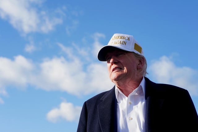 U.S. President Donald Trump reacts while speaking to the media before boarding Air Force One en route to Washington, D.C, at Morristown Municipal Airport in Morristown, New Jersey, U.S., April 27, 2025. REUTERS/Nathan Howard/File Photo