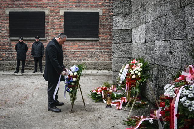 Second gentleman Douglas Emhoff lays wreaths honoring victims of the Holocaust during the International Holocaust Remembrance Day ceremony at Auschwitz, the Nazi concentration camp in Poland, Jan. 27, 2023. The day was created by the United Nations and takes place on the anniversary of Auschwitz's liberation. (Omar Marques/Getty Images)