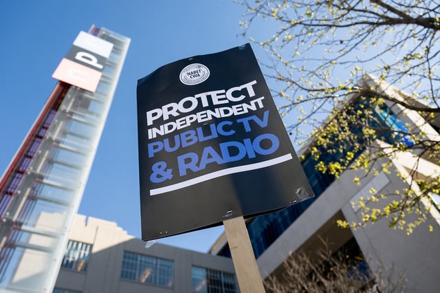 People call on Congress to protect funding for US broadcasters PBS and NPR outside the NPR headquarters in Washington, DC, on March 26, 2025.