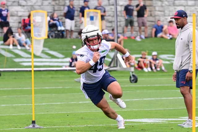 Jul 24, 2024; Foxborough, MA, USA;  New England Patriots long snapper Joe Cardona (49) runs through a drill during training camp at Gillette Stadium. Mandatory Credit: Eric Canha-USA TODAY Sports/File Photo