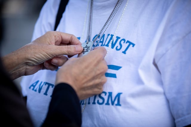 Students and members of the community join to remember the lives lost on the anniversary of the Hamas-led attacks on Israel at UC San Diego on Oct. 7, 2024.  (Ana Ramirez / The San Diego Union-Tribune)