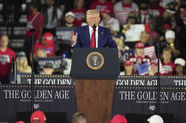 President Donald Trump speaks on his first 100 days at Macomb County Community College Sports Expo Center, Tuesday, April 29, 2025, in Warren, Mich. (AP Photo/Paul Sancya)