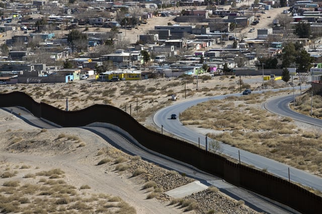 FILE - The Anapra neighborhood of Ciudad Juarez, Mexico, is seen behind the border wall in Sunland Park, N.M., Monday, Feb. 3, 2025. (AP Photo/Andres Leighton, File)