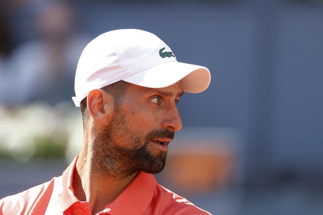 Tennis - Madrid Open - Park Manzanares, Madrid, Spain - April 26, 2025 Serbia's Novak Djokovic reacts during his round of 64 match against Italy's Matteo Arnaldi REUTERS/Juan Medina
