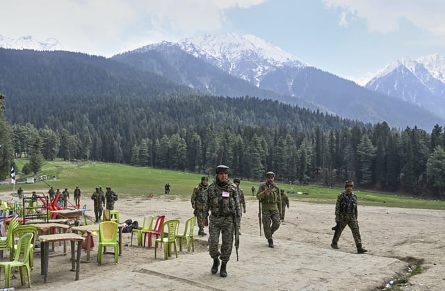 Indian security personnel inspect the site of a militant attack on tourists at Pahalgam in Indian controlled Kashmir, Wednesday, April 23, 2025. (AP Photo, File)
