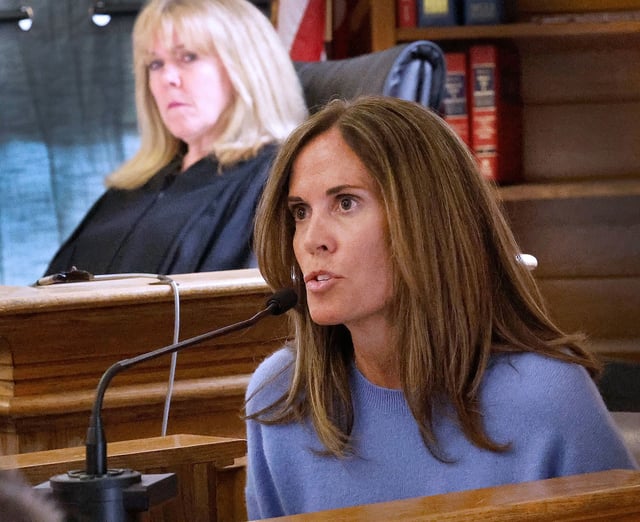Jennifer McCabe testifies as Judge Beverly Cannone listens in the background during the Karen Read murder trial Wednedsay in Norfolk Superior Court in Dedham, Massachusetts.