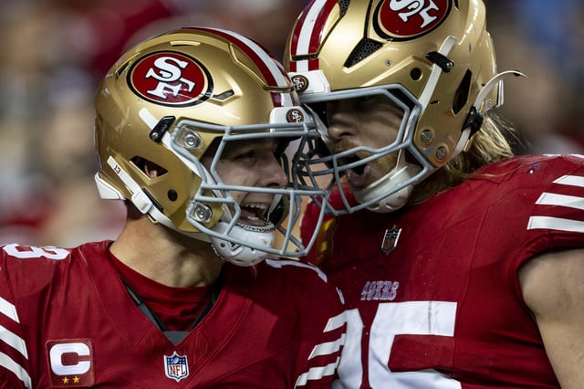 SANTA CLARA, CALIFORNIA - DECEMBER 30: Brock Purdy #13 of the San Francisco 49ers celebrates with George Kittle #85 of the San Francisco 49ers after scoring a touchdown during an NFL Football game against the Detroit Lions at Levi's Stadium on December 30, 2024 in Santa Clara, California.