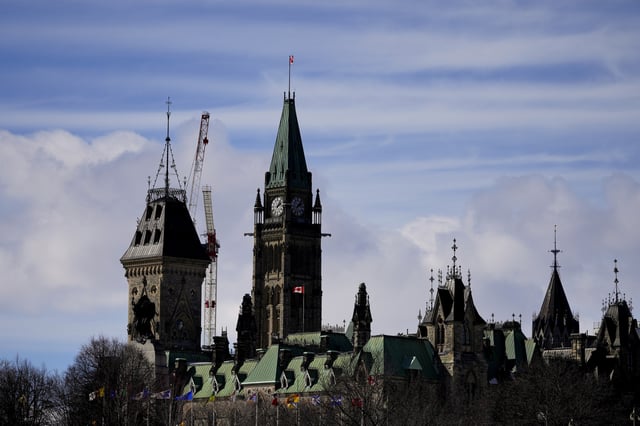 The Peace Tower on Parliament Hill is seen, as the Liberal Party of Canada picks its new leader at a conference centre nearby, in Ottawa on Sunday, March 9, 2025. 