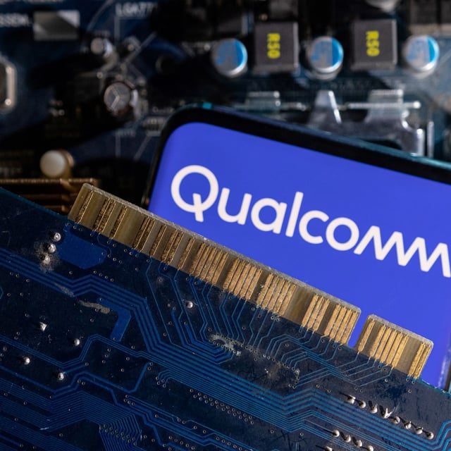 FILE PHOTO: A smartphone with a displayed Qualcomm logo is placed on a computer motherboard in this illustration taken March 6, 2023. REUTERS/Dado Ruvic/Illustration/File Photo