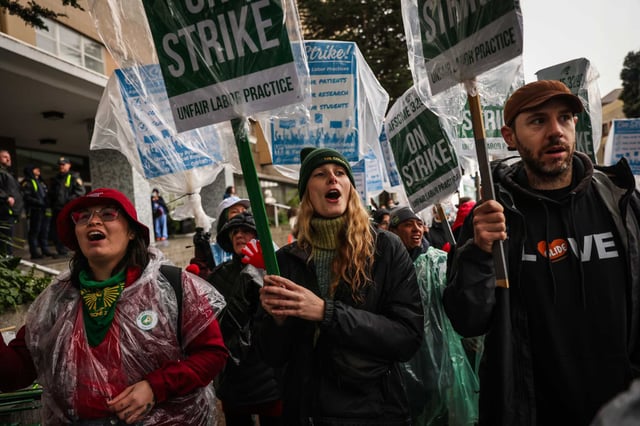 Union members chant during a joint protest by UPTE and AFSCME unions at the UCSF Parnassus campus in San Francisco in November. Another walkout by UC health workers Thursday is expected to affect the UCSF Mission Bay campus in San Francisco.