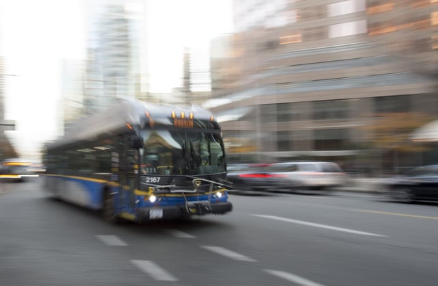 A bus is pictured in downtown Vancouver, Friday, November, 1, 2019. THE CANADIAN PRESS/Jonathan Hayward