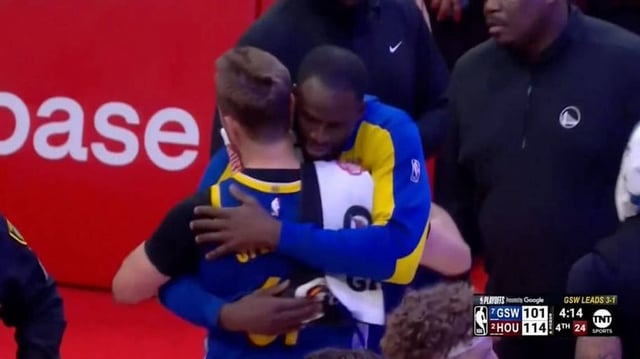Draymond Green hugs Pat Spencer after he’s ejected from Game 5 between the Golden State Warriors and Houston Rockets