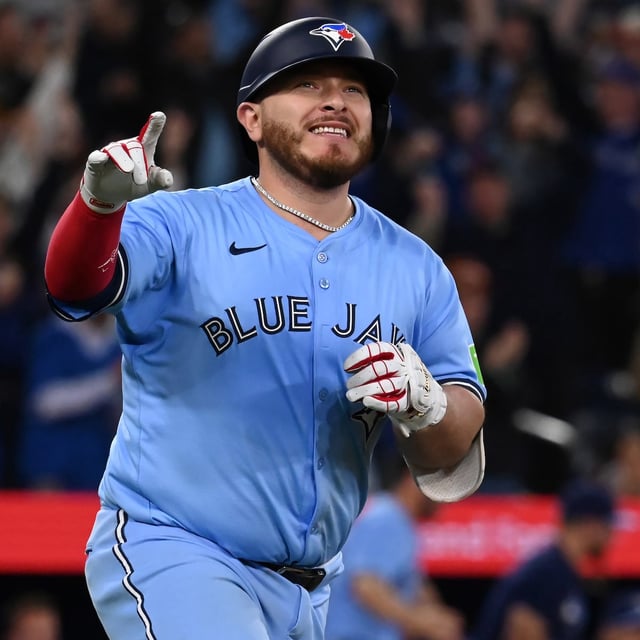 Toronto Blue Jays' Alejandro Kirk (30) runs to first base after hitting a walk-off RBI single in the tenth inning of American League baseball action to defeat the Boston Red Sox 7-6 in Toronto on Wednesday, April 30, 2025. THE CANADIAN PRESS/Jon Blacker