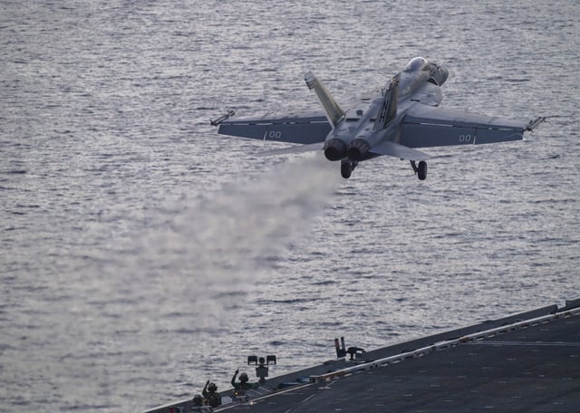 In this photograph released by the U.S. Navy, an F/A-18 Super Hornet launches off the flight deck of the Nimitz-class aircraft carrier USS Theodore Roosevelt on July 5, 2024, in the South China Sea.