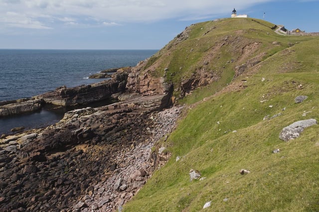 A rugged landscape of Stac Fada rocks in northwest Scotland, where ancient meteorite impact evidence is preserved.