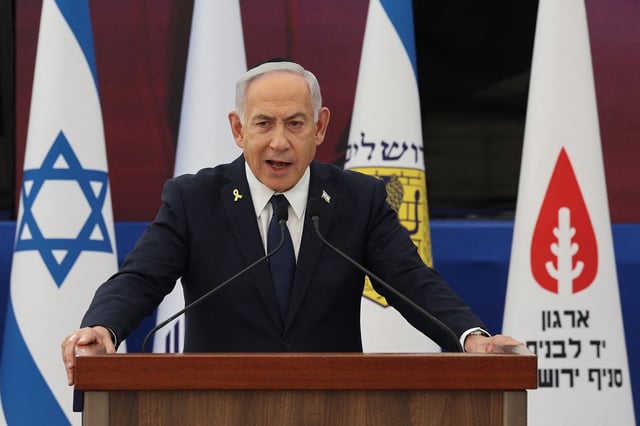Israeli Prime Minister Benjamin Netanyahu speaks during the annual ceremony at the eve of Israel's Remembrance Day for fallen soldiers (Yom HaZikaron) at the Yad LaBanim Memorial in Jerusalem, on April 29, 2025. (Photo by Abir SULTAN / POOL / AFP) (Photo by ABIR SULTAN/POOL/AFP via Getty Images)          