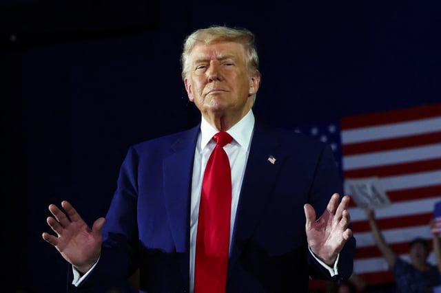 U.S. President Donald Trump attends a rally to mark his 100th day in office, at Macomb Community College in Warren, Michigan, U.S., April 29, 2025. REUTERS/Evelyn Hockstein/File photo