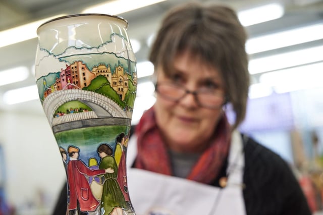 Moorcroft designer Kerry Goodwin with one of the pottery firm&#39;s products
(Photo: Phil Crow)