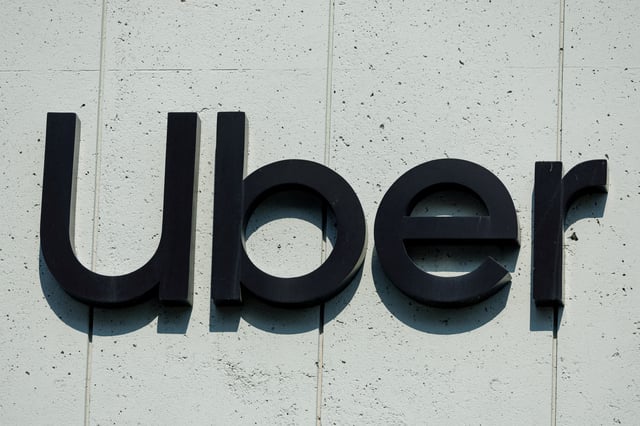 The Uber logo is shown on the building in Los Angeles, California, U.S., February 14, 2024.  REUTERS/Mike Blake/File Photo/File Photo