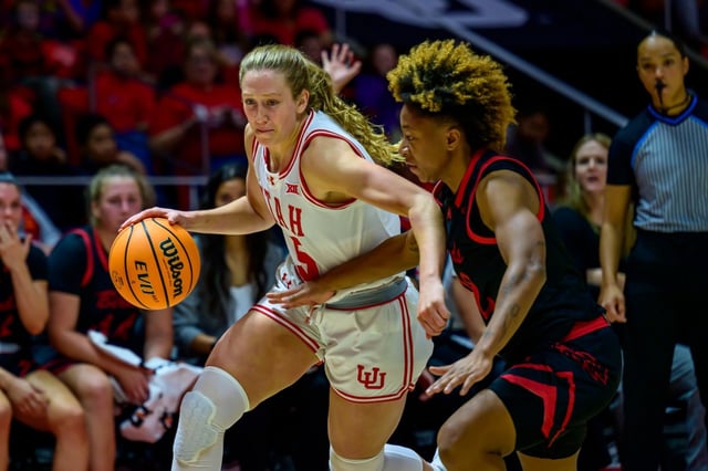Gianna Kneepkens, left, seen playing for Utah while defended by Southern Utah’s Daylani Ballena on Nov. 4, 2024 in Salt Lake City, Utah, has decided to transfer to UCLA. (AP Photo/Tyler Tate)