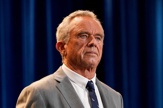 U.S. Health and Human Services (HHS) Secretary Robert F. Kennedy, Jr. listens to a reporter's question during a press conference announcing of the U.S. Food and Drug Administration's (FDA) intent to phase out the use of petroleum-based synthetic dyes in the nation's food supply, at the Department of Health and Human Services in Washington, D.C., U.S., April 22, 2025. REUTERS/Elizabeth Frantz