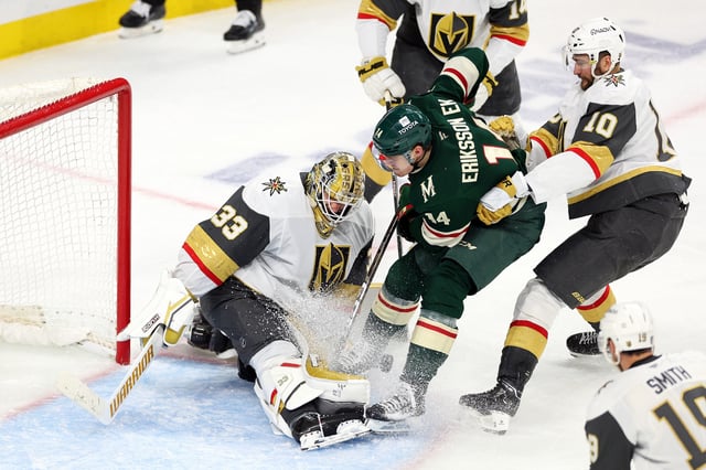 Adin Hill #33 of the Vegas Golden Knights makes a save against Joel Eriksson Ek #14 of the Minnesota Wild during overtime of Game Four of the First Round of the 2025 Stanley Cup Playoffs at Xcel Energy Center on April 26, 2025 in St Paul, Minnesota. The Golden Knights defeated the Wild 4-3 in double overtime.