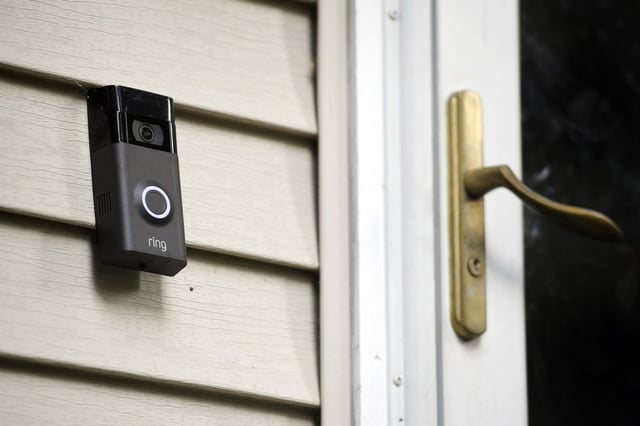 FILE – a Ring doorbell camera is seen installed outside a home in Wolcott, Conn., on July 16, 2019. Amazon has provided Ring doorbell footage to law enforcement 11 times this year without the user’s permission, a revelation that’s bound to raise more privacy and civil liberty concerns about its video-sharing agreements with police departments across the country. The disclosure came in a letter from the company that was made public Wednesday, July 13, 2022, by U.S. Sen. Edward Markey, D-Mass.  (AP Photo/Jessica Hill, File)