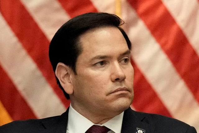 FILE PHOTO: U.S. Secretary of State Marco Rubio attends a meeting of the Eradicating Anti-Christian Bias Task Force at the Justice Department in Washington, D.C., U.S., April 22, 2025. REUTERS/Ken Cedeno/File Photo