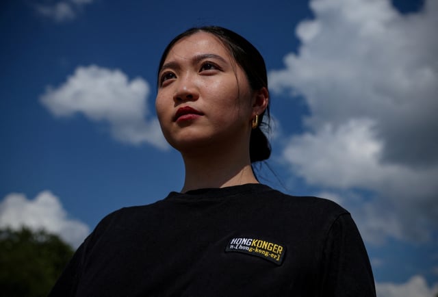 Anna Kwok, 26, a Washington D.C. based Hong Kong activist, who has been designated by the Hong Kong police as a fugitive with a $1 million Hong Kong dollars bounty offered for her arrest, is photographed near the White House in Washington, DC, U.S., July 10, 2023. REUTERS/Evelyn Hockstein/File Photo
